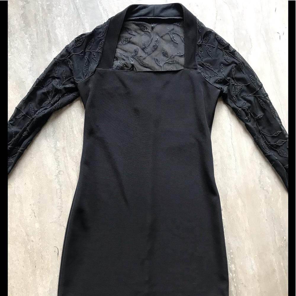 Black dress by Peep.